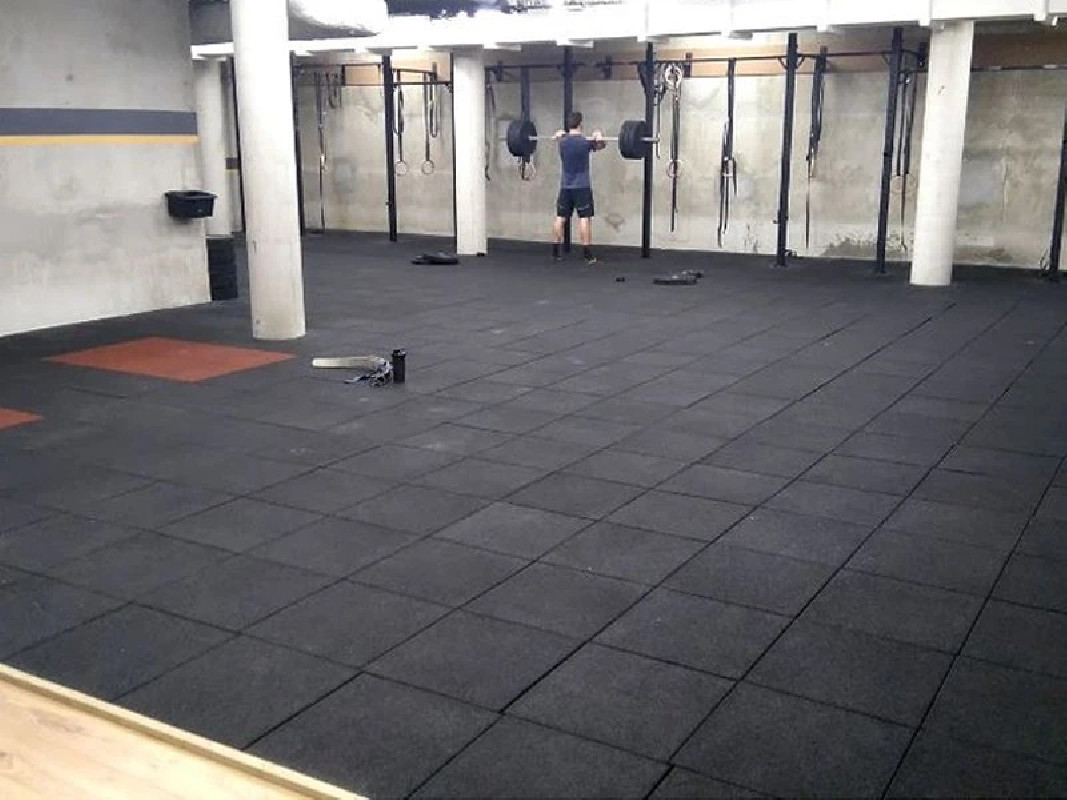 Dalle amortissante salle de sport - Norme anti-feu